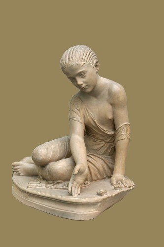 682px-Roman_statue_of_girl_playing_astragaloi_14_aC